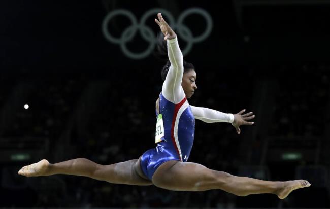 The United States’ Simone Biles performs on the balance beam during the artistic gymnastics women's individual all-around final at the 2016 Summer Olympics in Rio de Janeiro, Brazil, Aug. 11, 2016. Biles is returning to competition at the U.S. Classic on Saturday, two years after a bout with “the twisties“ forced her to remove herself from several events at the Tokyo Olympics. (Rebecca Blackwell / ASSOCIATED PRESS)