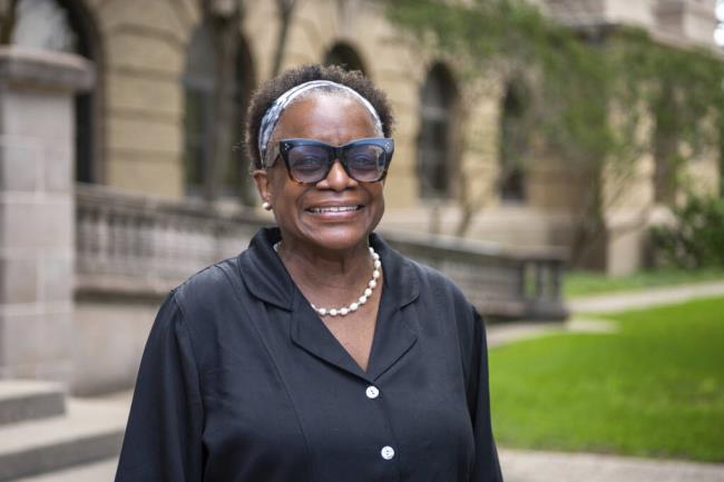 FILE - Kathleen McElroy poses Tuesday, June 13, 2023, in College Station, Texas. Texas A&M University reached a $1 million settlement Thursday, Aug. 3, 2023, with McElroy,  a Black journalism professor, after botched attempts to hire her unraveled after pushback over her past work promoting diversity. (Meredith Seaver/College Station Eagle via AP, File)