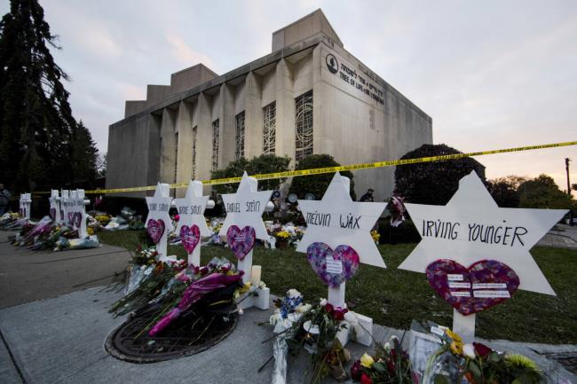 FILE - A makeshift memorial stands outside the Tree of Life Synagogue in the aftermath of a deadly shooting in Pittsburgh, Oct. 29, 2018. Robert Bowers, the man who killed 11 co<em></em>ngregants at the Pittsburgh synagogue, was formally sentenced to death on Thursday, Aug. 3, 2023, one day after a jury determined that capital punishment was appropriate for the perpetrator of the deadliest attack on Jews in U.S. history. (AP Photo/Matt Rourke, File)