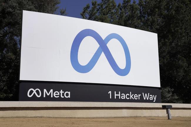 FILE - Facebook's me<em></em>ta logo sign is seen at the company headquarters in Menlo Park, Calif., on, Oct. 28, 2021. (AP Photo/Tony Avelar, File)