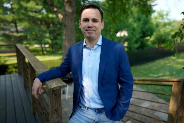 KCCI-TV chief meteorologist Chris Glo<em></em>ninger stands outside his home, Tuesday, June 27, 2023, in West Des Moines, Iowa. 