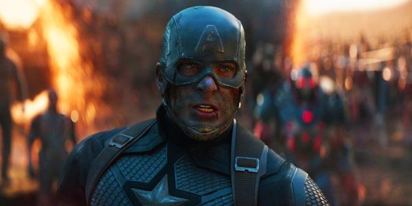 Captain America covered in dirt in front of portals and other heroes in Avengers Endgame's final battle